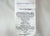 A white fabric tag lists details like “diamond support,” sterilized duck feather, Millbrae, CA address, size, filling weight, and 100% cotton cover—identifying this as a Down Etc. Diamond Support Feather & Down Pillow | Medium-Firm.